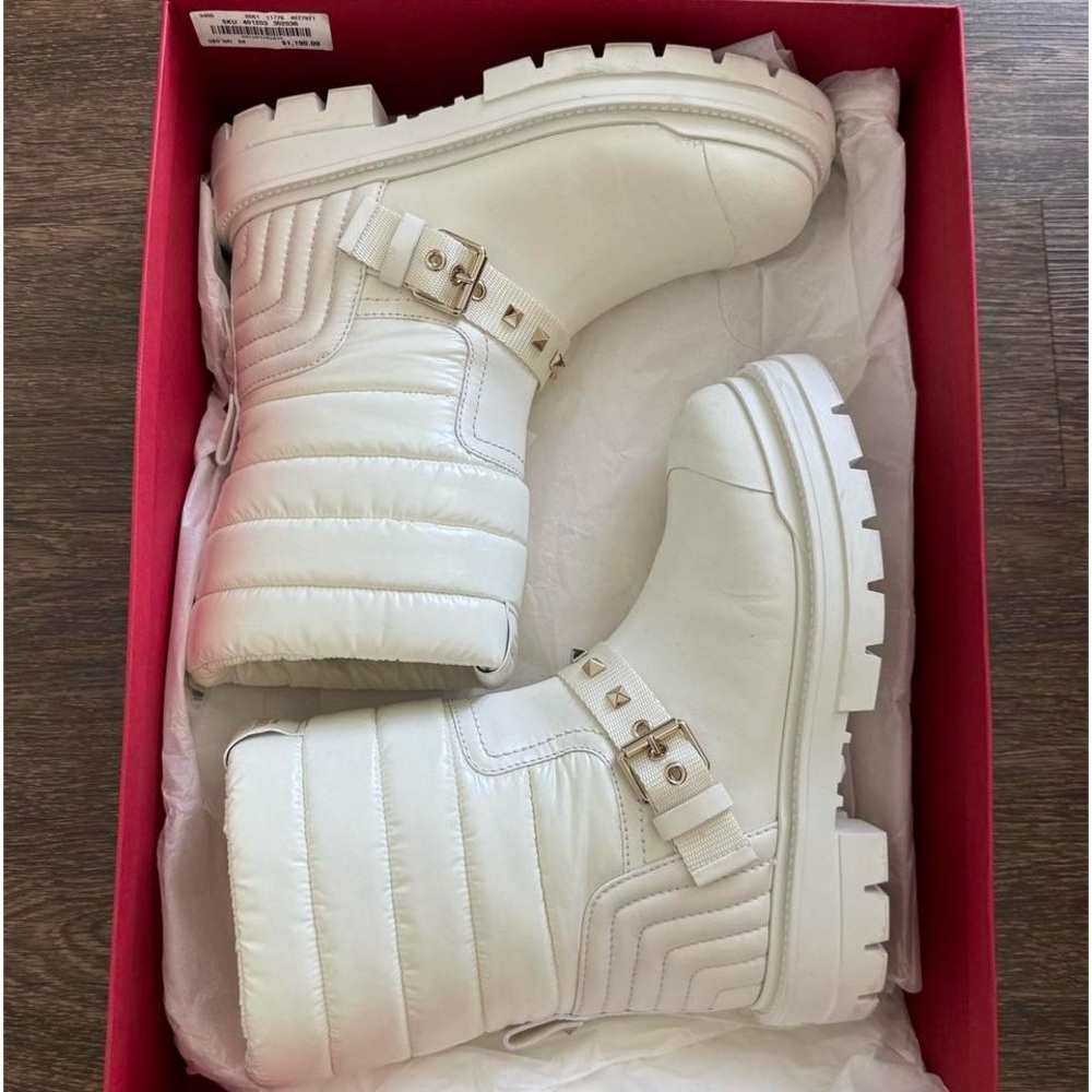 White Valentino boots.